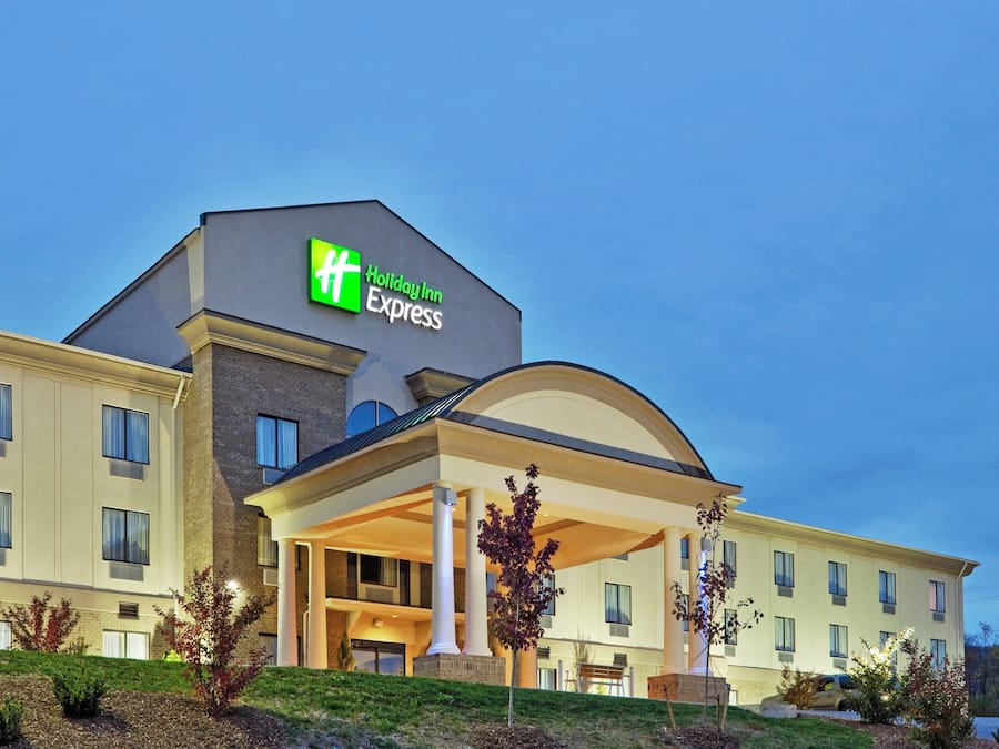 A Holiday Inn Express hotel with a covered entrance and multiple windows.