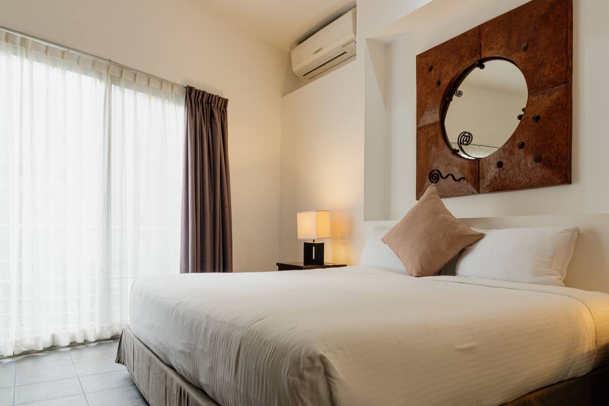 Traditional Condo | Premium bedding, down duvets, in-room safe, blackout curtains