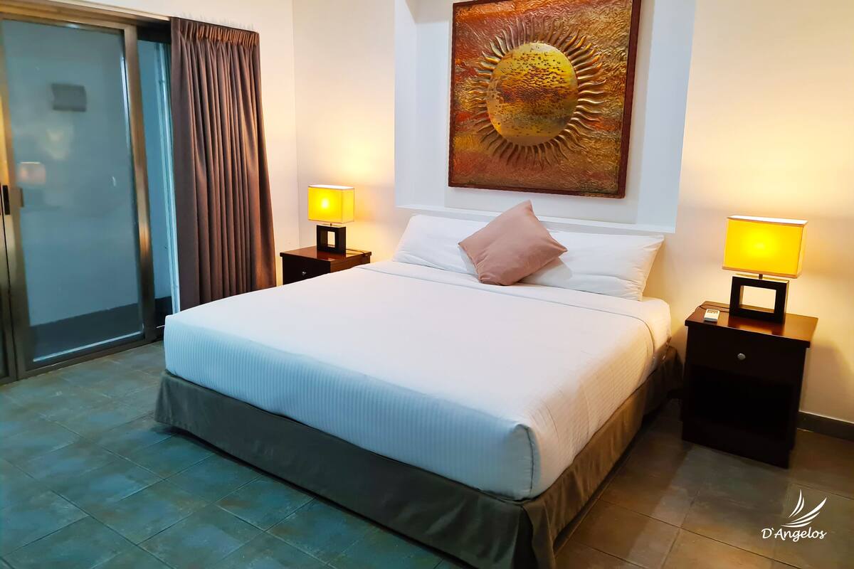 Superior Condo | Premium bedding, down duvets, in-room safe, blackout curtains