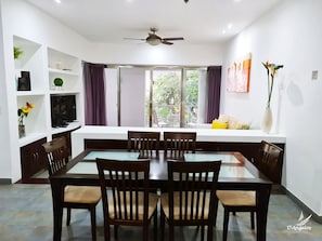 Junior Suite | Living room | 40-inch flat-screen TV with cable channels, TV - Almarea Vacation Condo (Playa del Carmen)