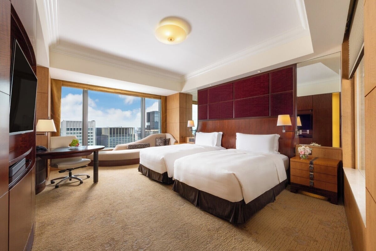 Premium bedding, down comforters, pillowtop beds, minibar