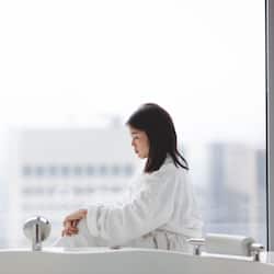 Combined shower/tub, designer toiletries, hair dryer, bathrobes