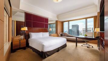 Premium bedding, down comforters, pillowtop beds, minibar