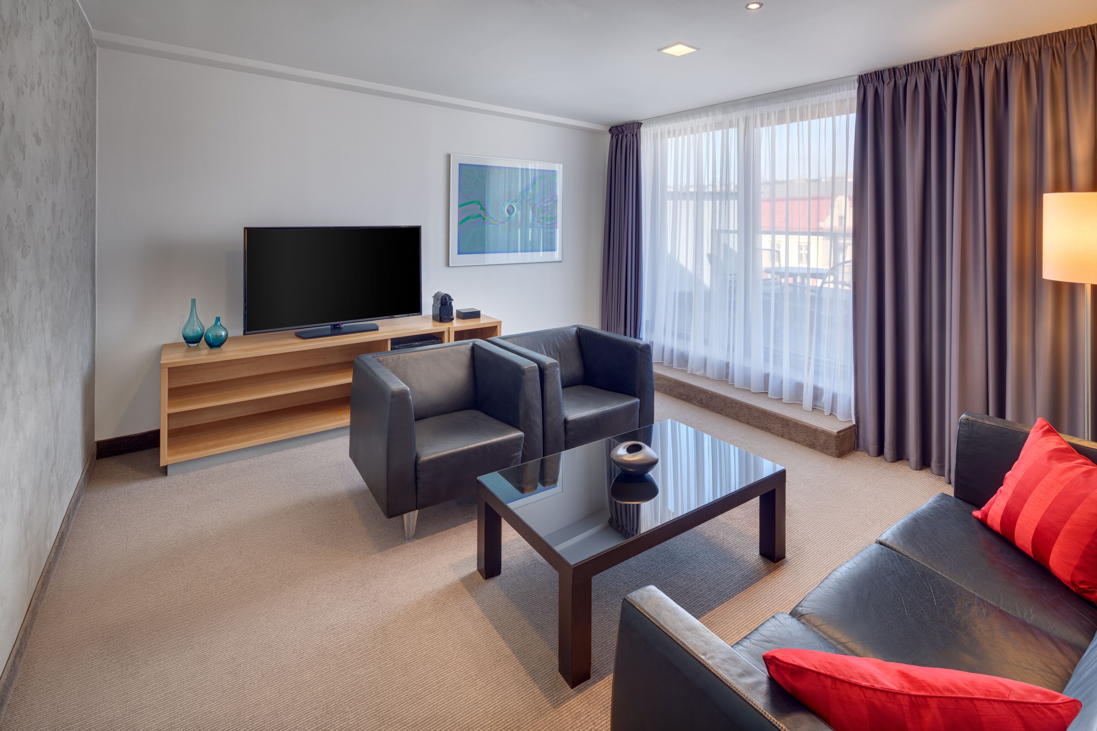 executive suite | living room | 26-inch flat-screen tv with satellite channels, tv
