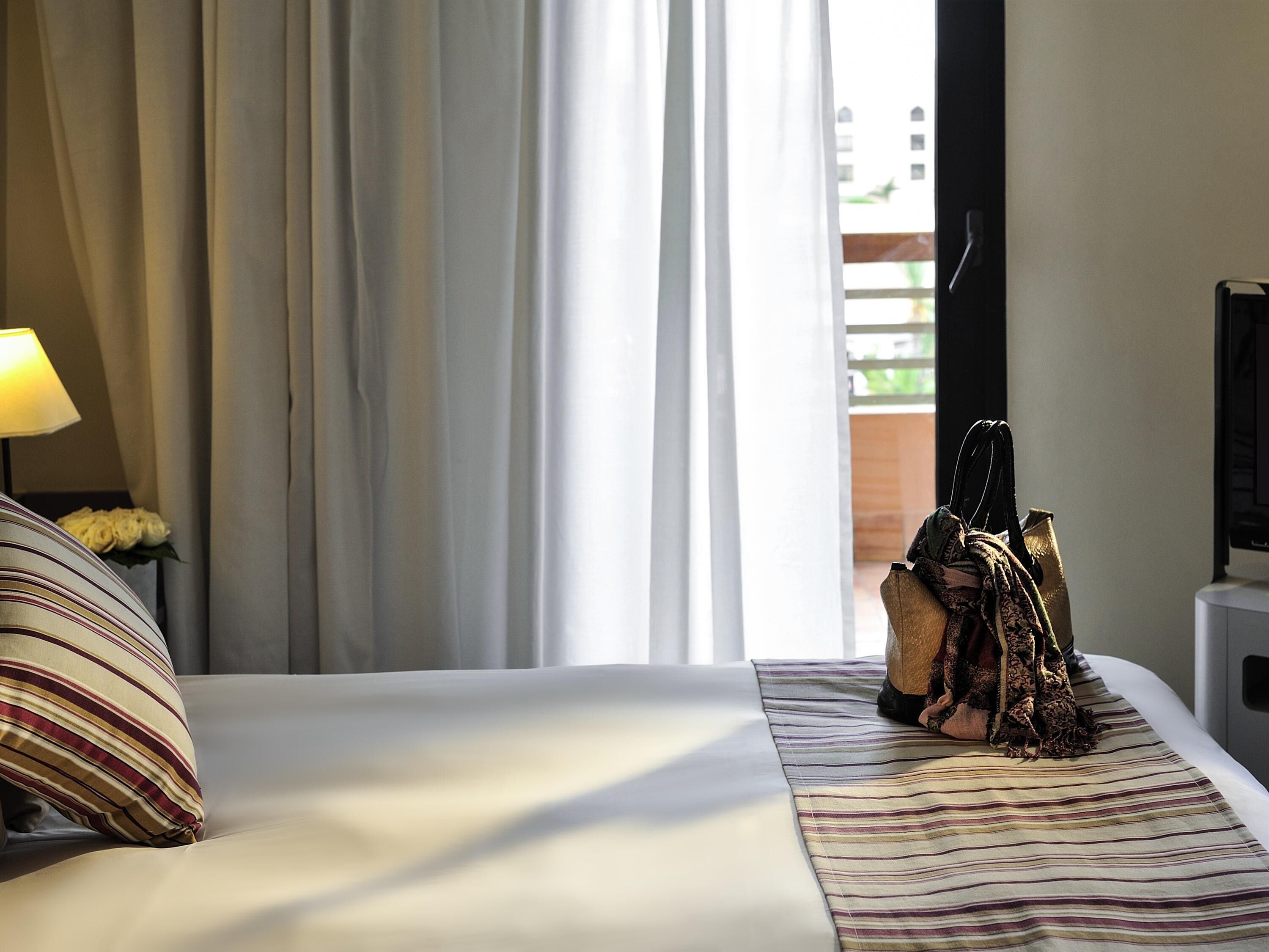 Premium bedding, in-room safe, desk, soundproofing