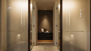hallway leading to a cozy room with a personal touch.