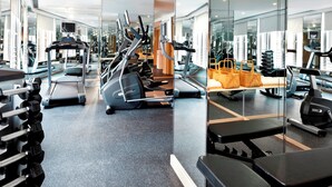 A gym with treadmills, elliptical machines, and free weights. - Dorsett Mongkok, Hong Kong (Kowloon)