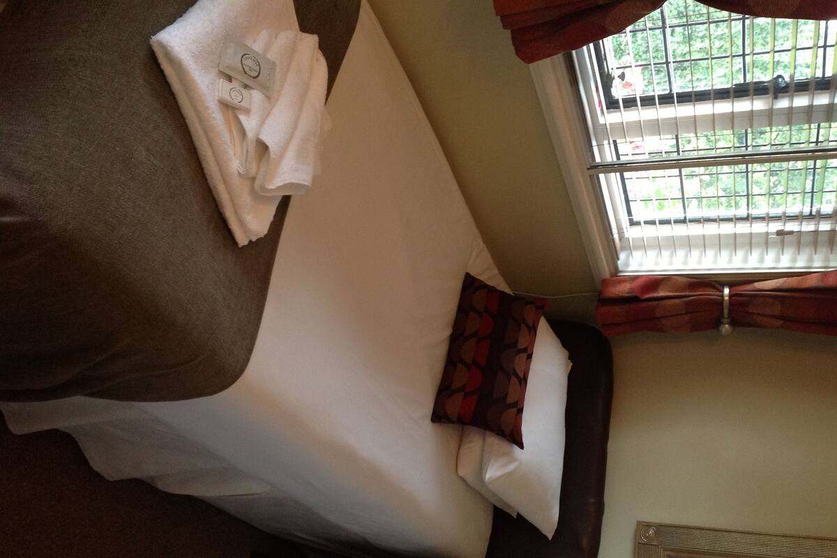 Premium bedding, iron/ironing board, WiFi (free), bed sheets