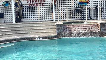 Outdoor pool, a heated pool, pool umbrellas, sun loungers