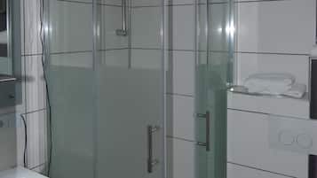 Shower, free toiletries, hair dryer, towels