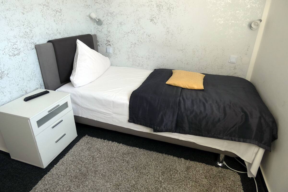 Desk, blackout curtains, iron/ironing board (on request), free WiFi