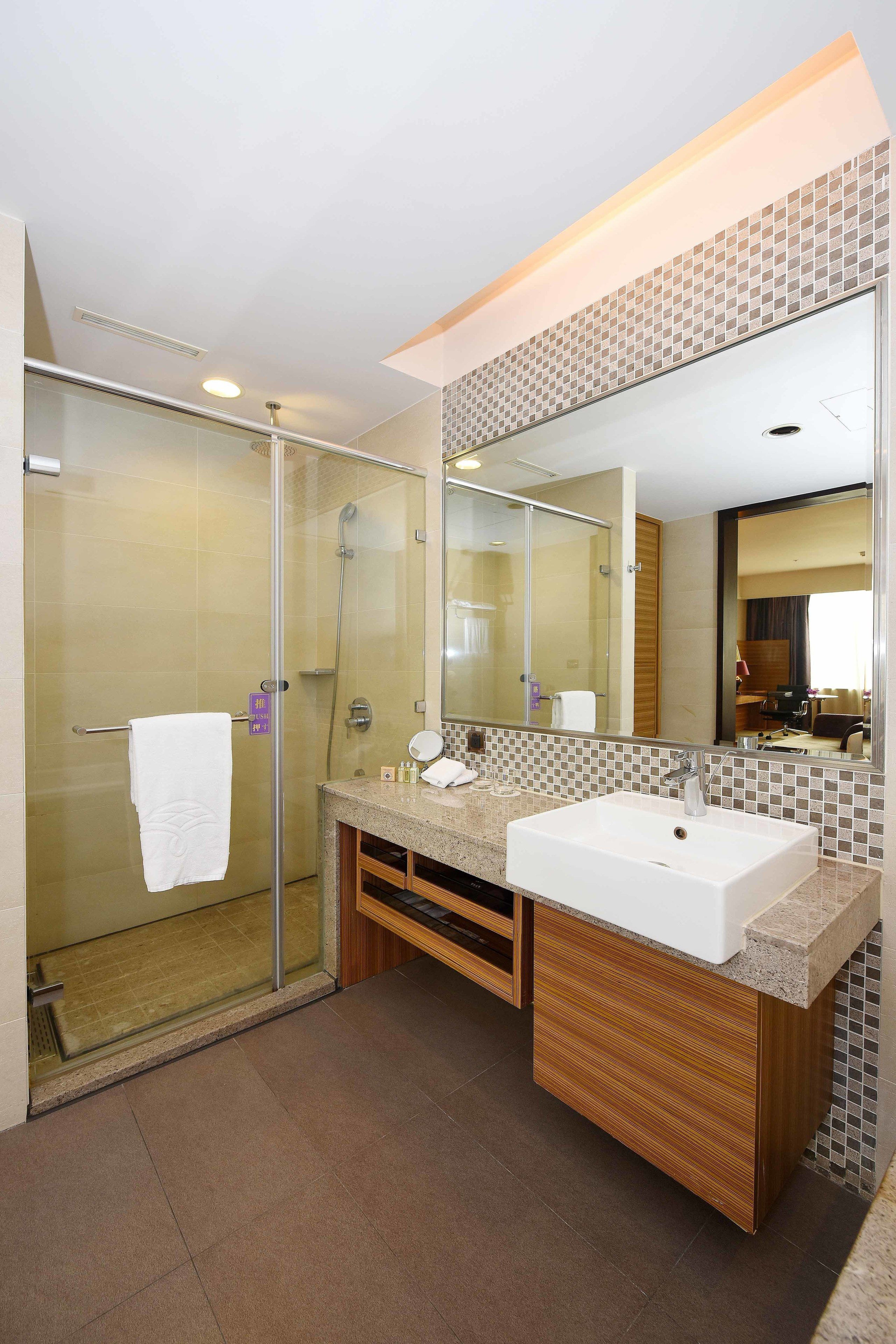 separate bathtub and shower, free toiletries, hair dryer, slippers