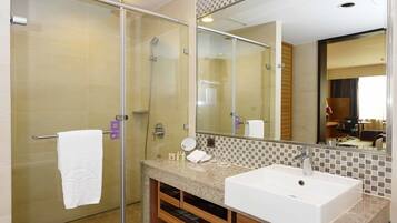 Separate tub and shower, hair dryer, slippers, bidet