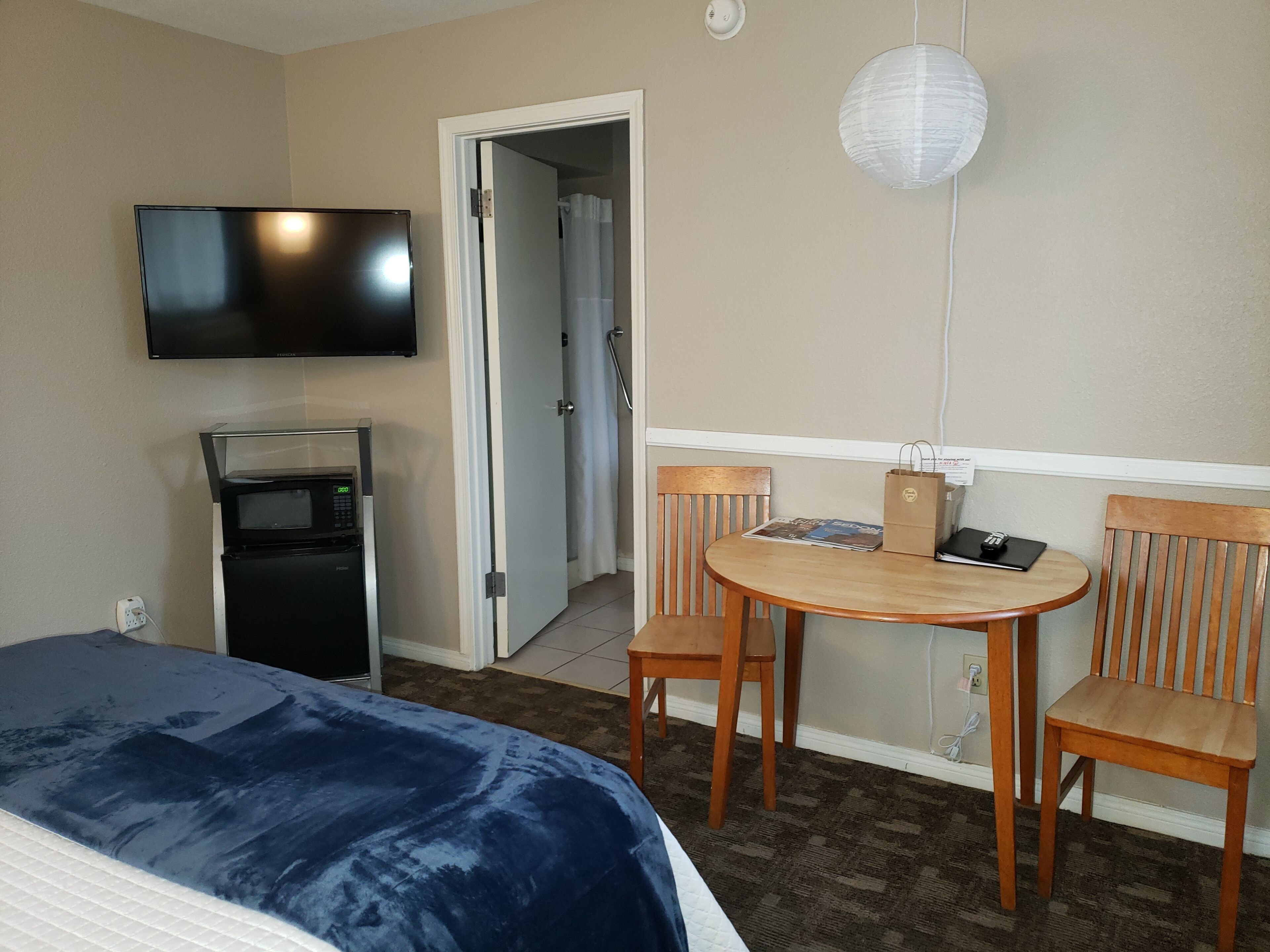 deluxe room, 1 queen bed | individually furnished, laptop workspace, blackout curtains, free wifi