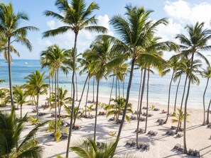 Private beach, white sand, sun loungers, beach towels