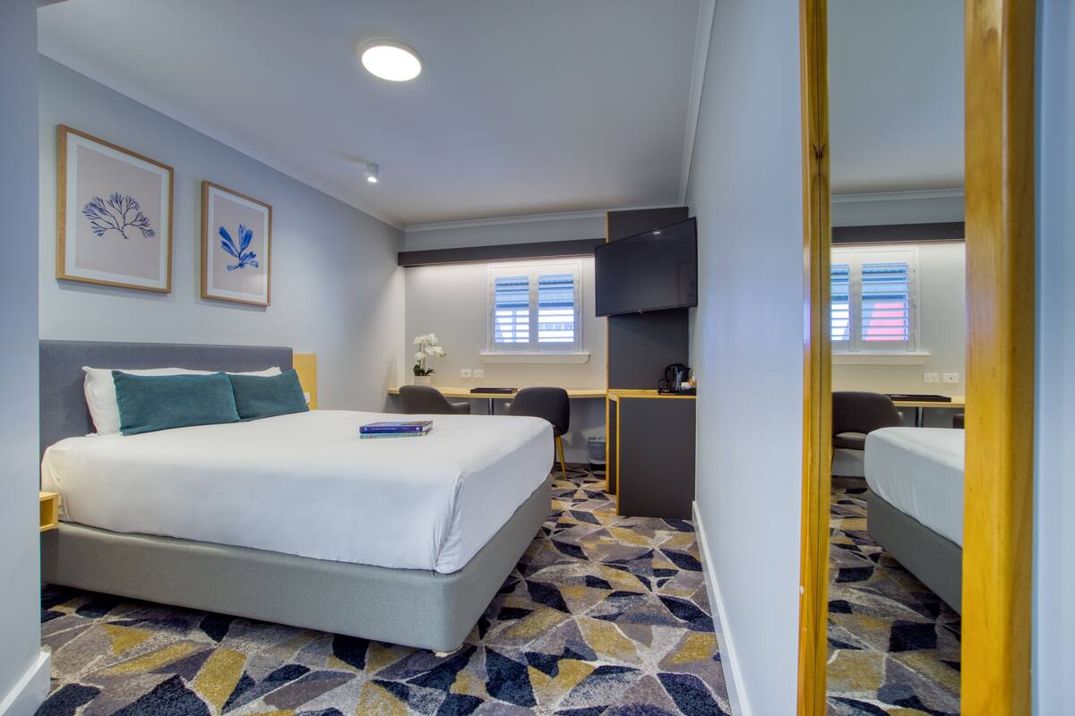 deluxe room, 1 king bed | 1 bedroom, pillow-top beds, desk, iron/ironing board