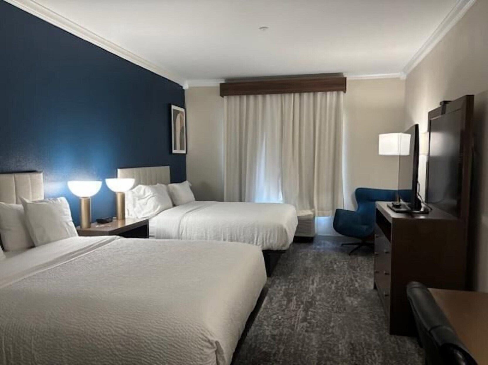 Premium bedding, down comforters, desk, laptop workspace