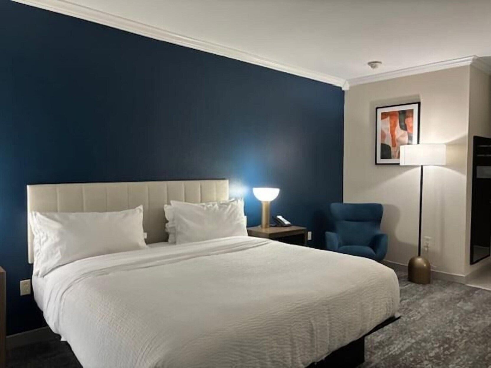 Premium bedding, down comforters, desk, laptop workspace