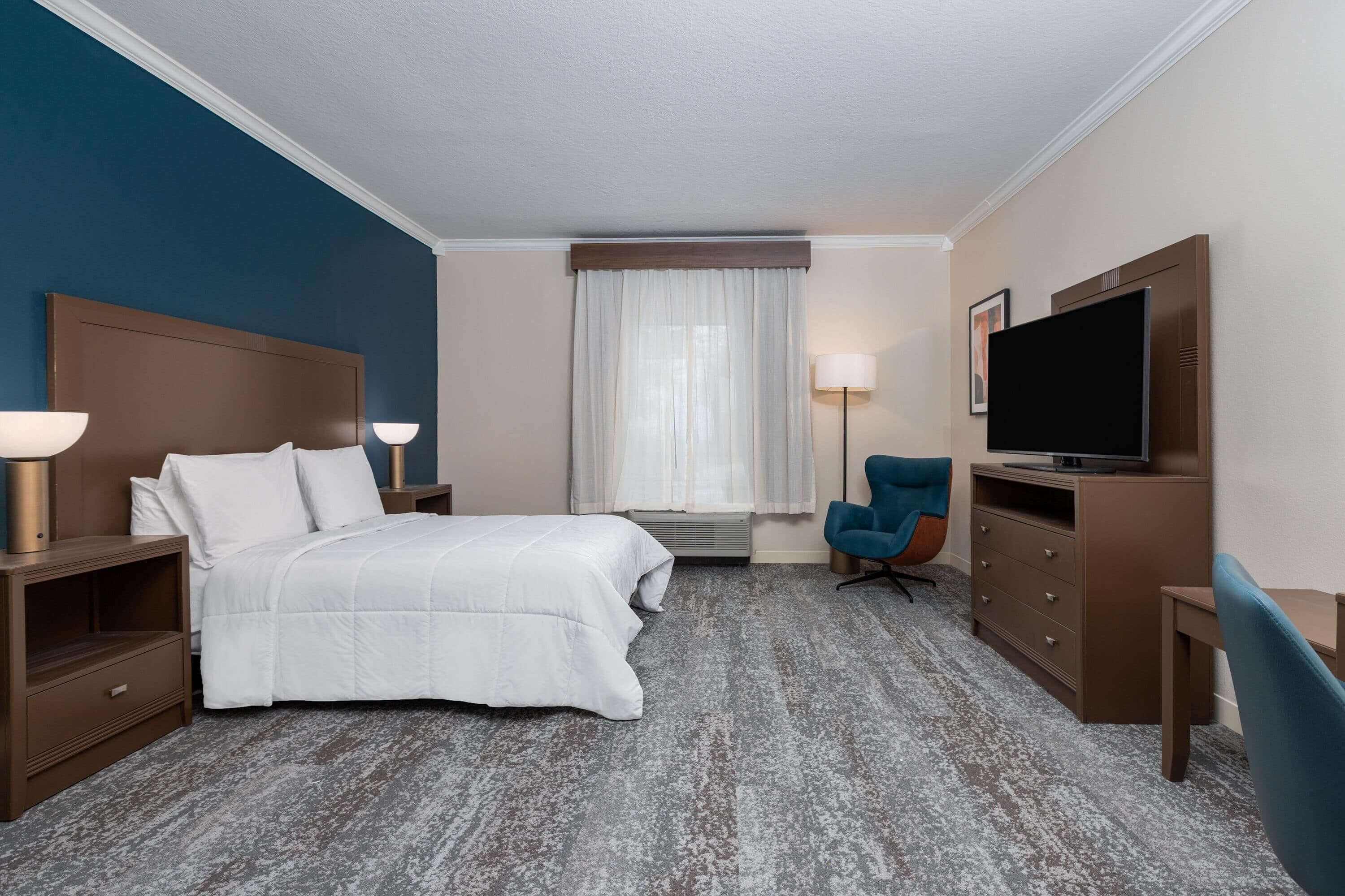 Premium bedding, down duvets, desk, laptop workspace