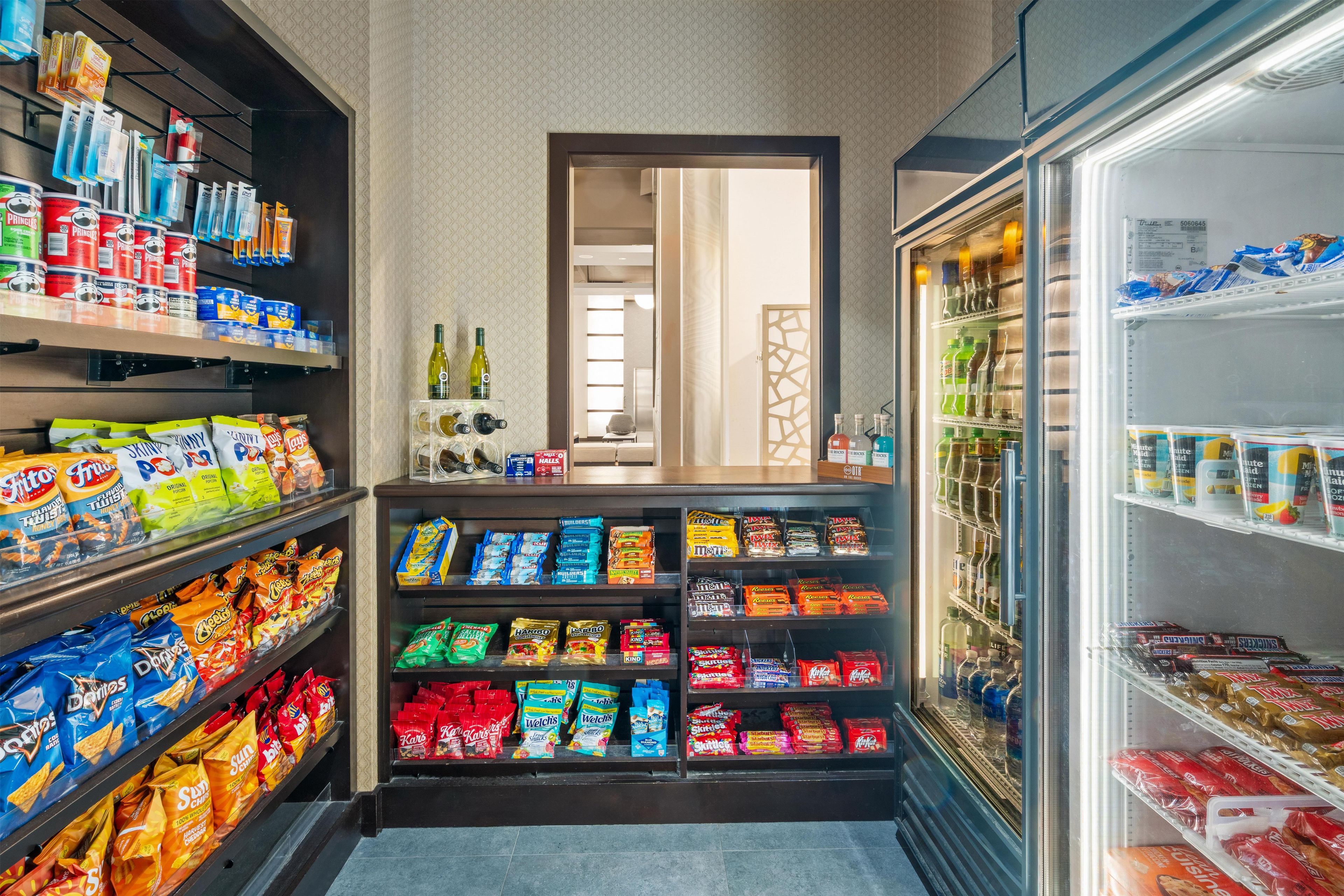 A snack and beverage section with various packaged snacks and drinks.