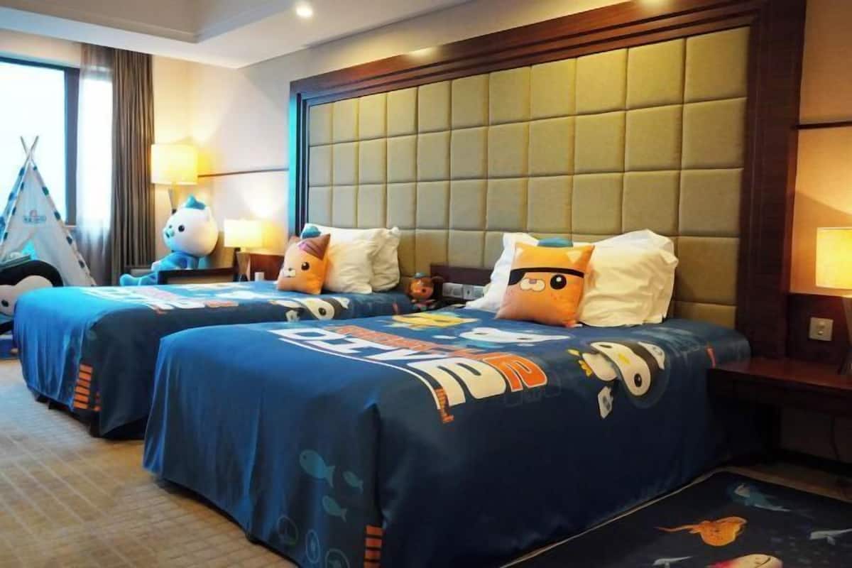 Luxe beddengoed, een minibar, een kluis op de kamer, een bureau