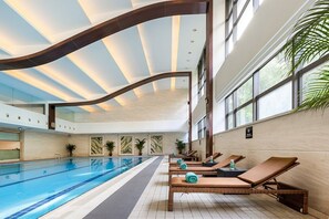 Indoor pool, pool loungers, lifeguards on site