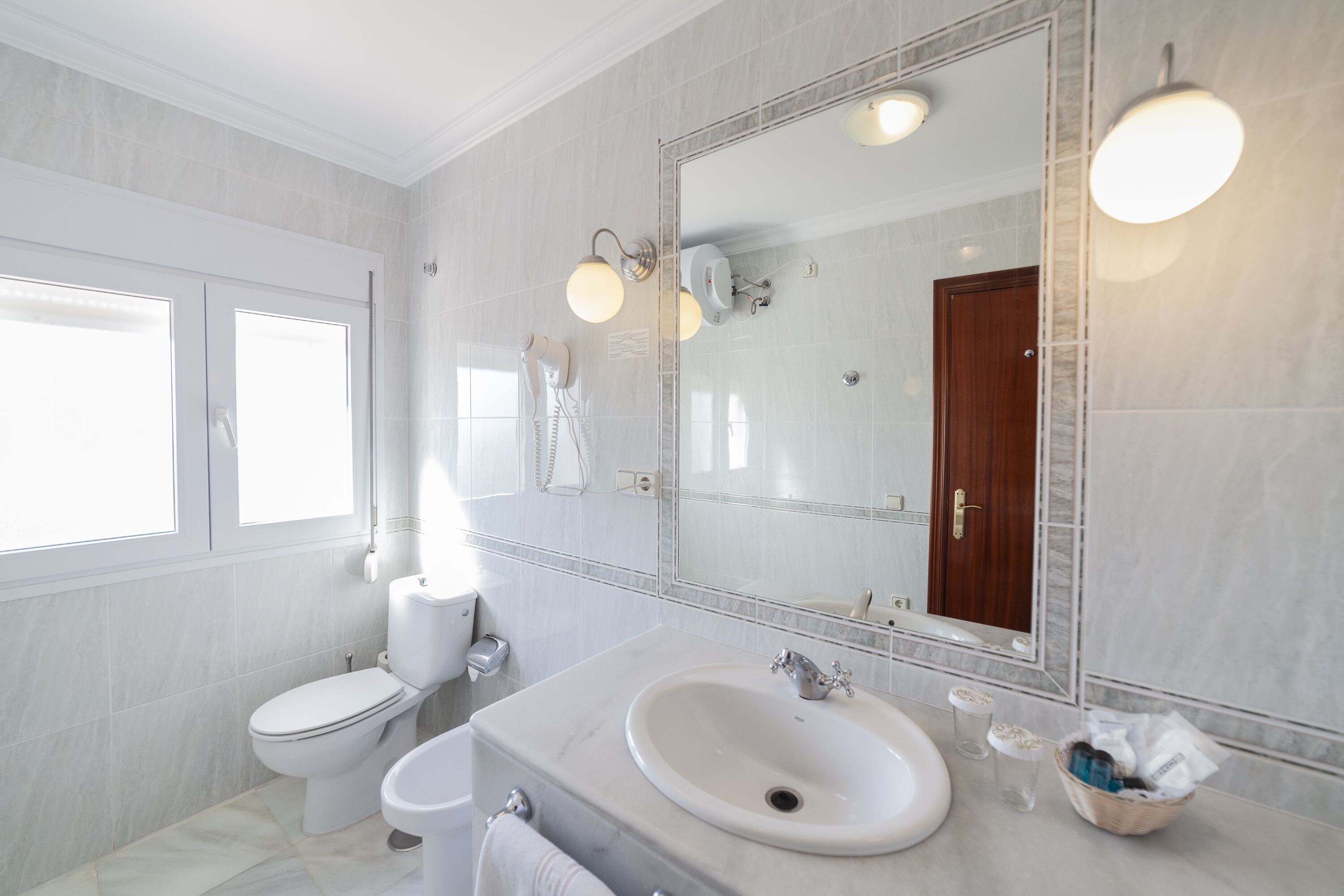 single room | bathroom | hair dryer, towels, soap, shampoo