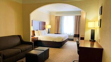 Desk, laptop workspace, blackout drapes, iron/ironing board