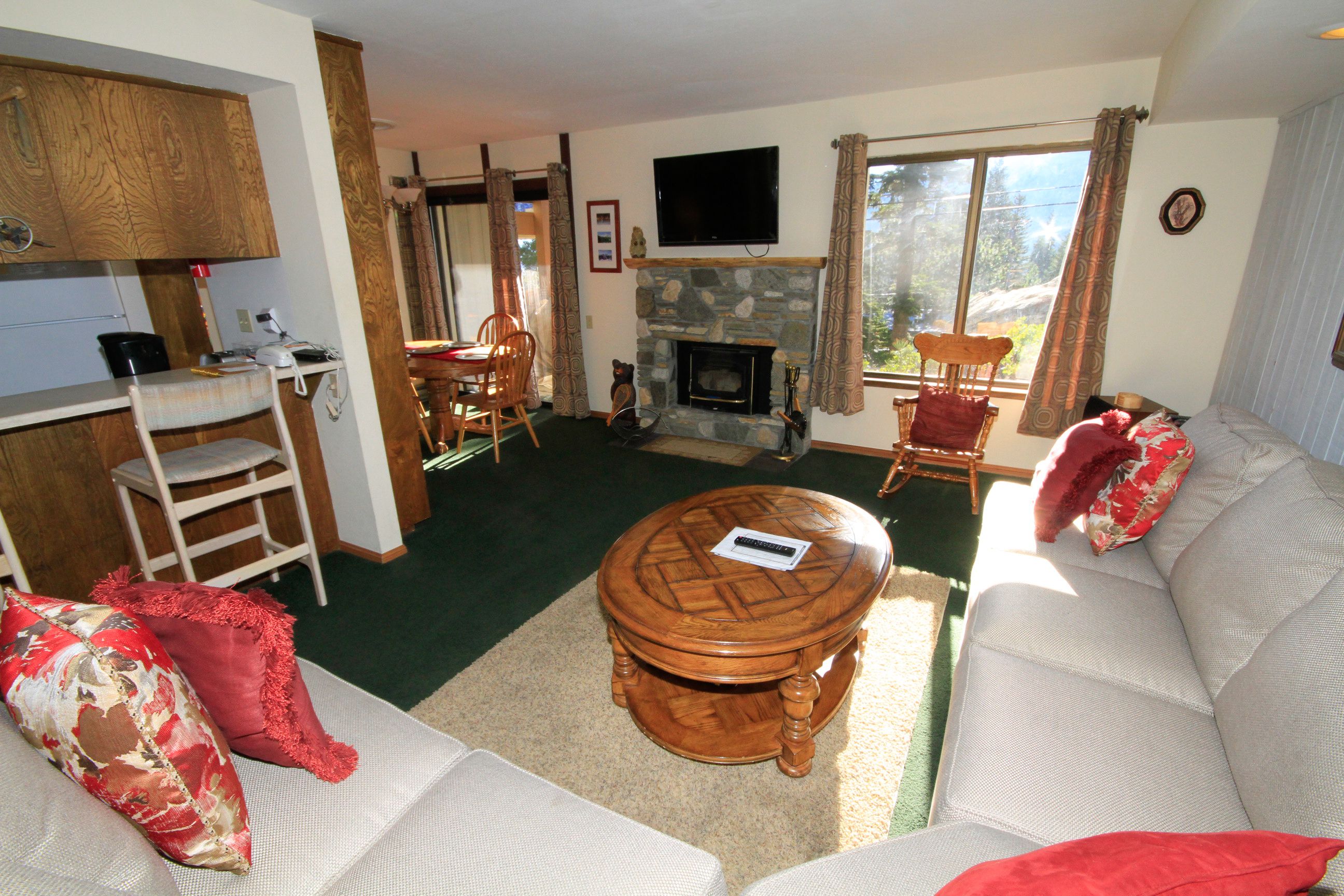 1-Bedroom Condo | Living room | TV, fireplace, DVD player