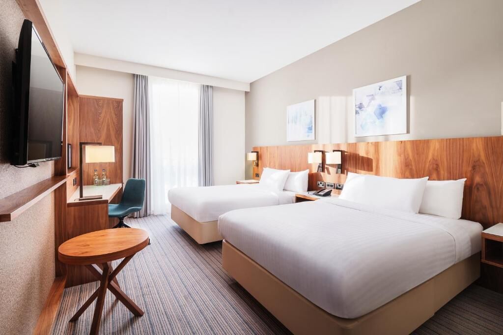 family room, 2 double beds | egyptian cotton sheets, premium bedding, in-room safe, desk