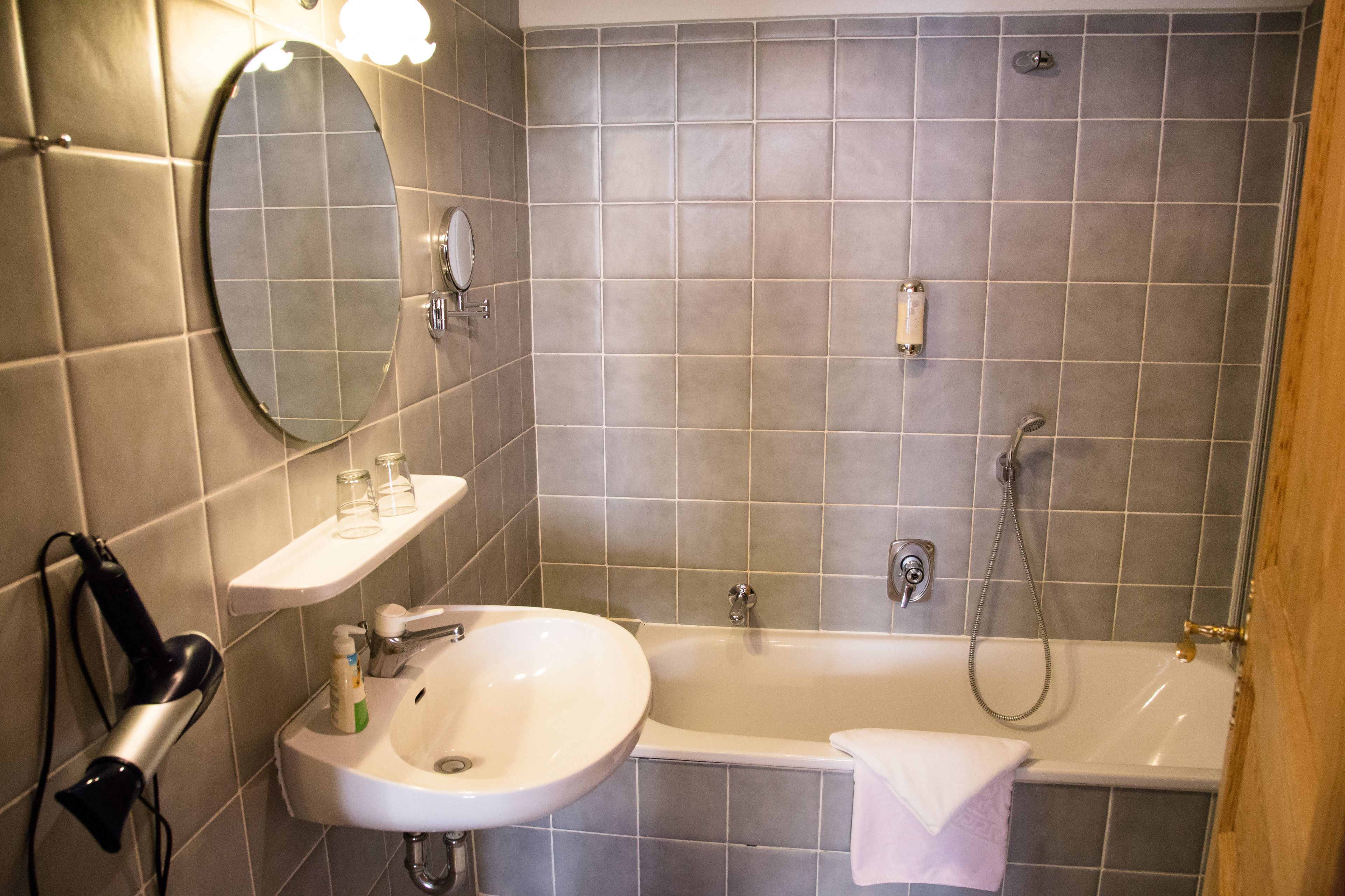 superior double room, private bathroom | bathroom | designer toiletries, hair dryer, towels