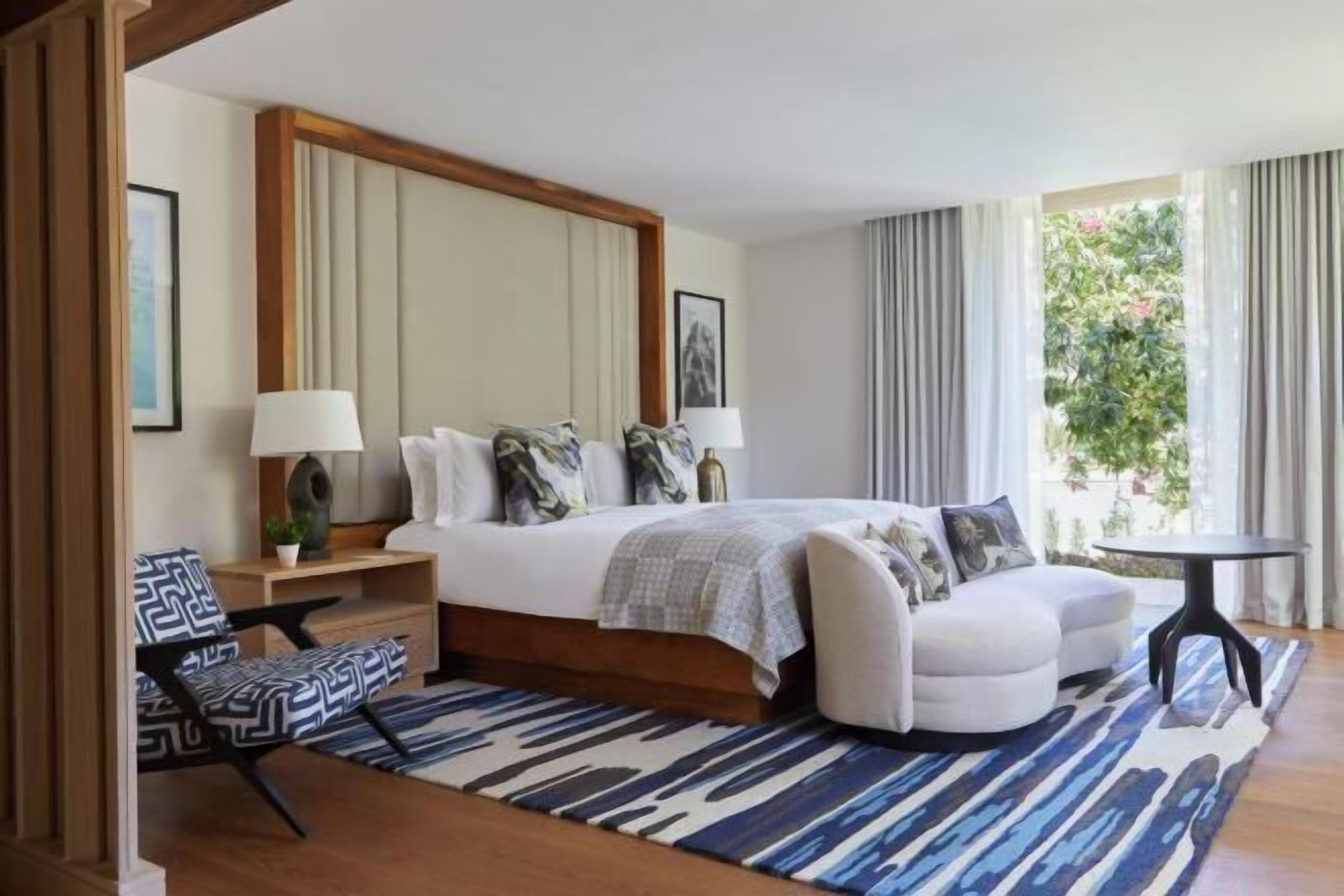 Premium bedding, down comforters, pillowtop beds, free minibar items