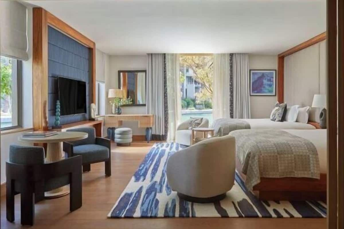 Premium bedding, down duvets, pillow-top beds, free minibar items