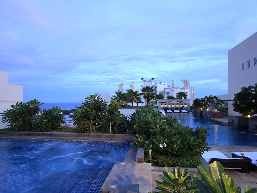 Outdoor pool, open 6 AM to 10 PM, pool umbrellas, pool loungers