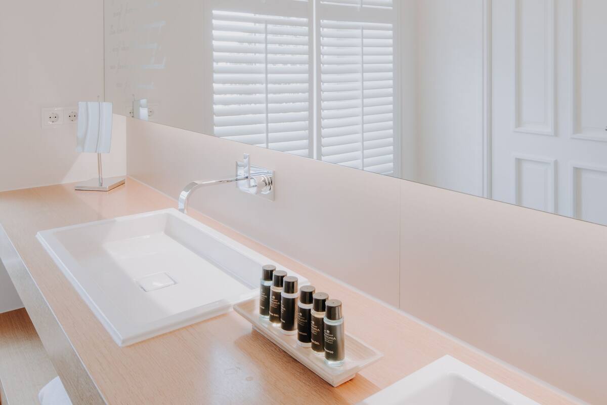 suite | bathroom | hair dryer, towels