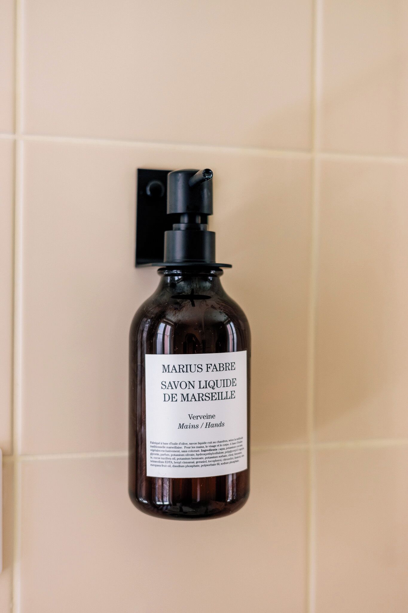 designer toiletries, hair dryer, towels, shampoo