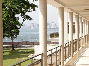 Overlooking a serene body of water, this property offers stunning views of the city skyline.