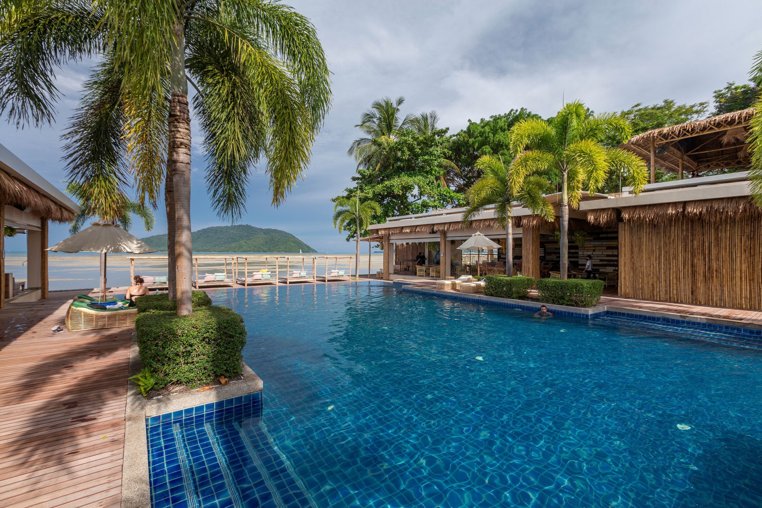 outdoor pool, pool umbrellas, pool loungers