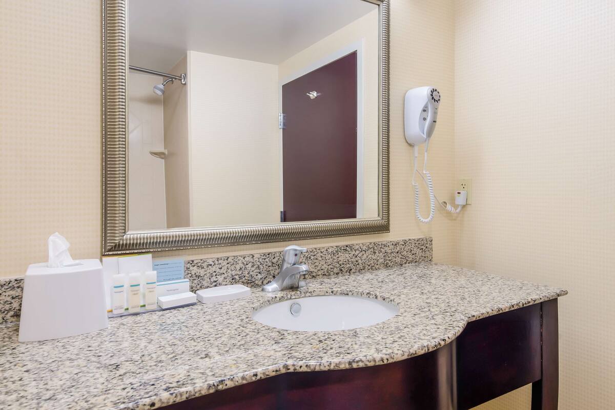 two queen beds non smoking | bathroom | bathtub, hair dryer