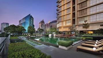 Outdoor pool, pool umbrellas, pool loungers