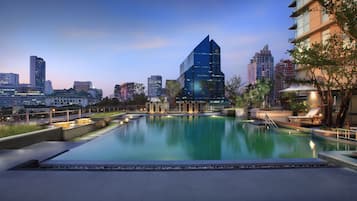 Outdoor pool, pool umbrellas, pool loungers