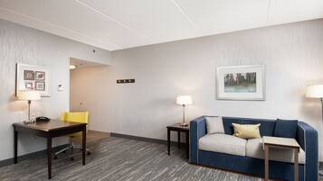 Hypo-allergenic bedding, desk, blackout drapes, iron/ironing board