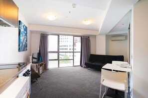 Appartamento Superior, 1 camera da letto | Area soggiorno | TV a schermo piatto