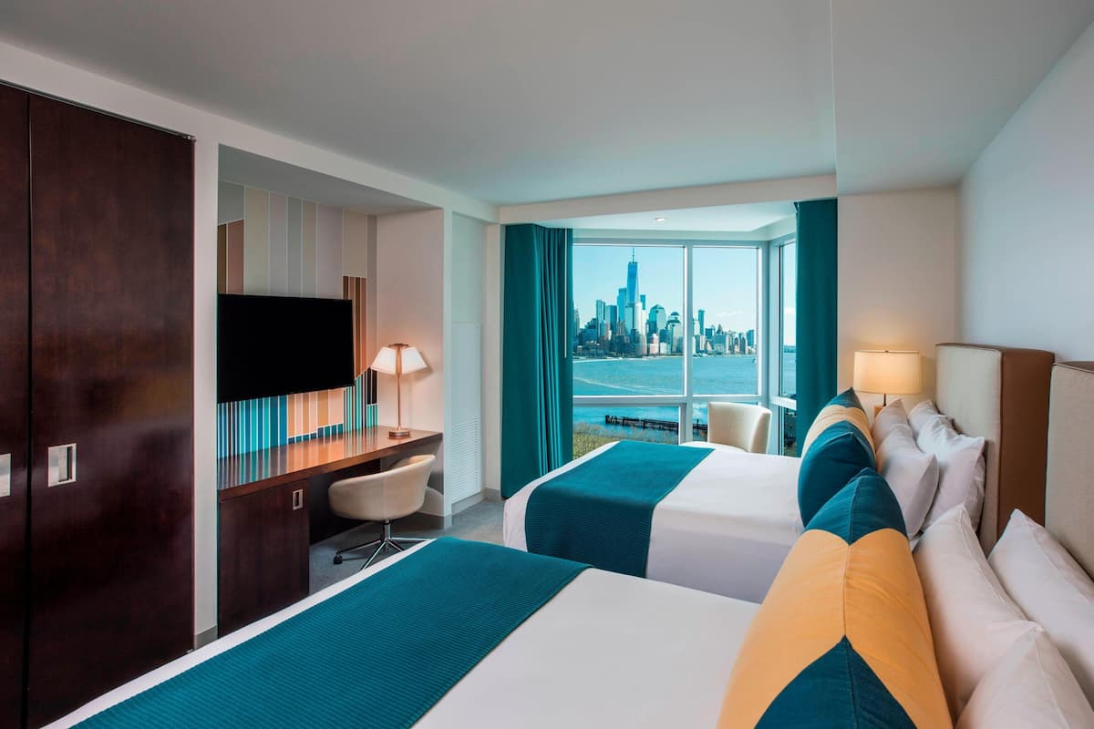 Premium bedding, pillow-top beds, minibar, in-room safe