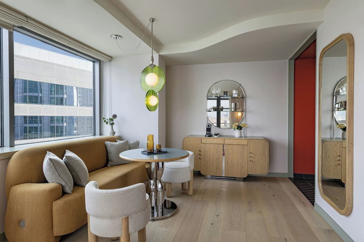 Fantastic Room, Junior Suite, 1 Bedroom, River View | Living area | 50-inch LCD TV with satellite channels, TV, iPod dock