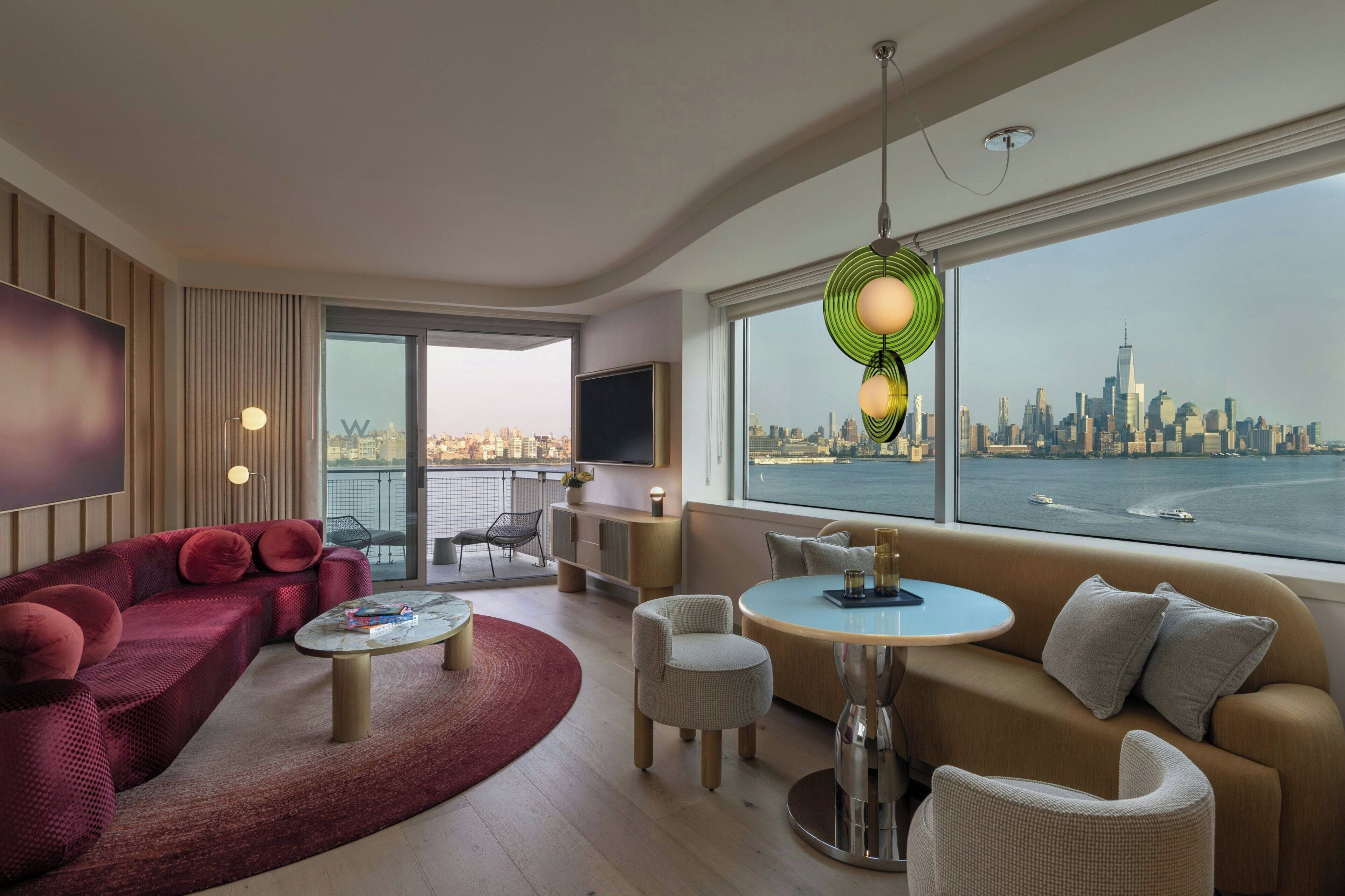 Fantastic Room, Junior Suite, 1 Bedroom, River View | Living area | 50-inch LCD TV with satellite channels, TV, iPod dock