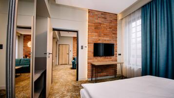 Deluxe-Apartment | Allergikerbettwaren, Minibar, Schreibtisch, Bügeleisen/Bügelbrett