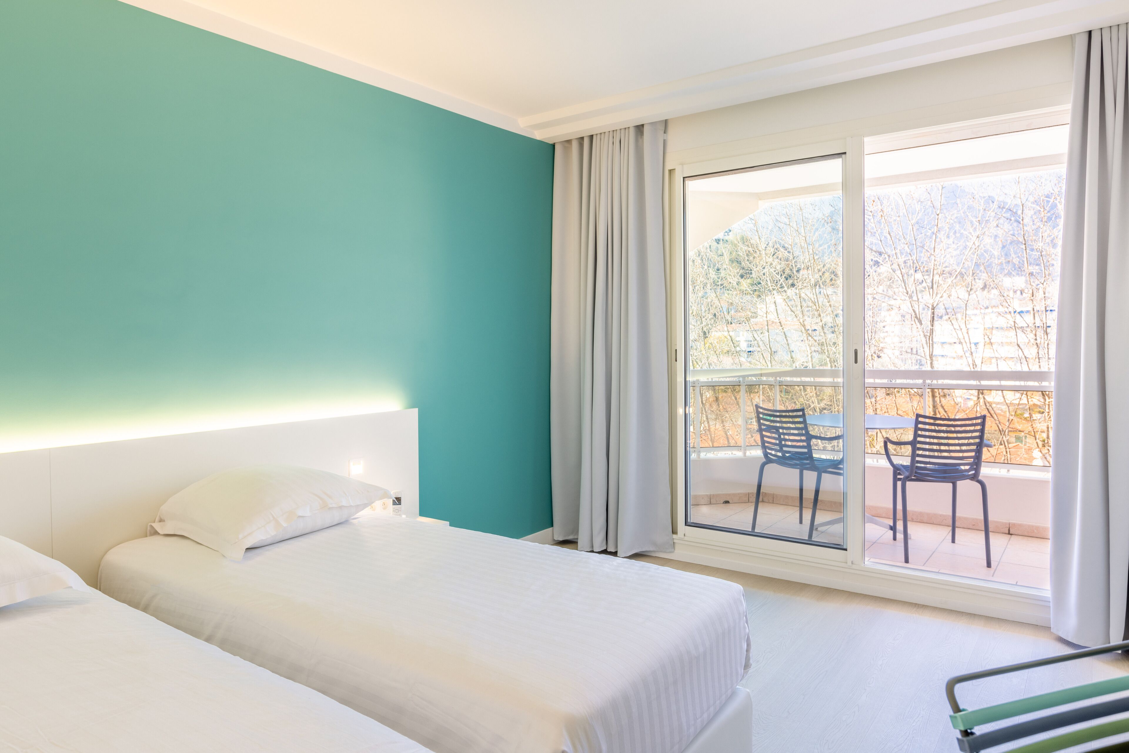 double or twin room, terrace, mountain view | minibar, in-room safe, individually decorated, desk