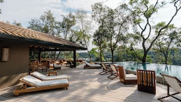2 outdoor pools, pool umbrellas, sun loungers