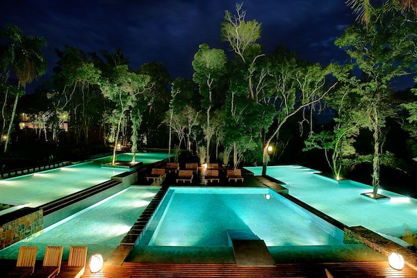 2 outdoor pools, pool umbrellas, pool loungers